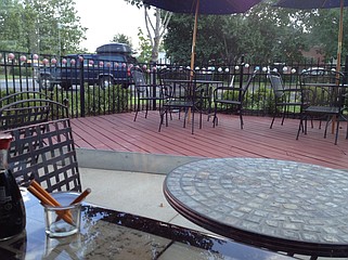 Arkansas Democrat-Gazette/ERIC HARRISON - Patio (as viewed from the dining room) at Chi's Asian in Riverdale.